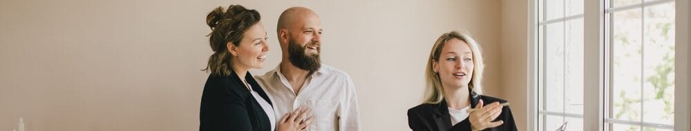 Couple meeting to discover what is a buyers agent